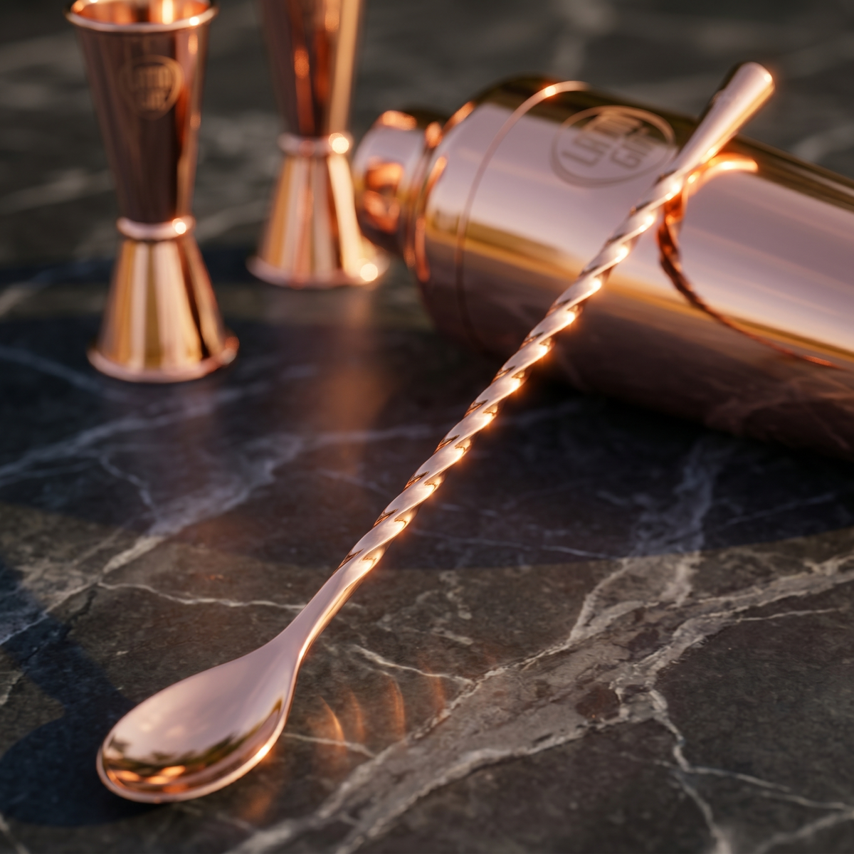 Detail of the rose gold bar spoon and its twisted handle