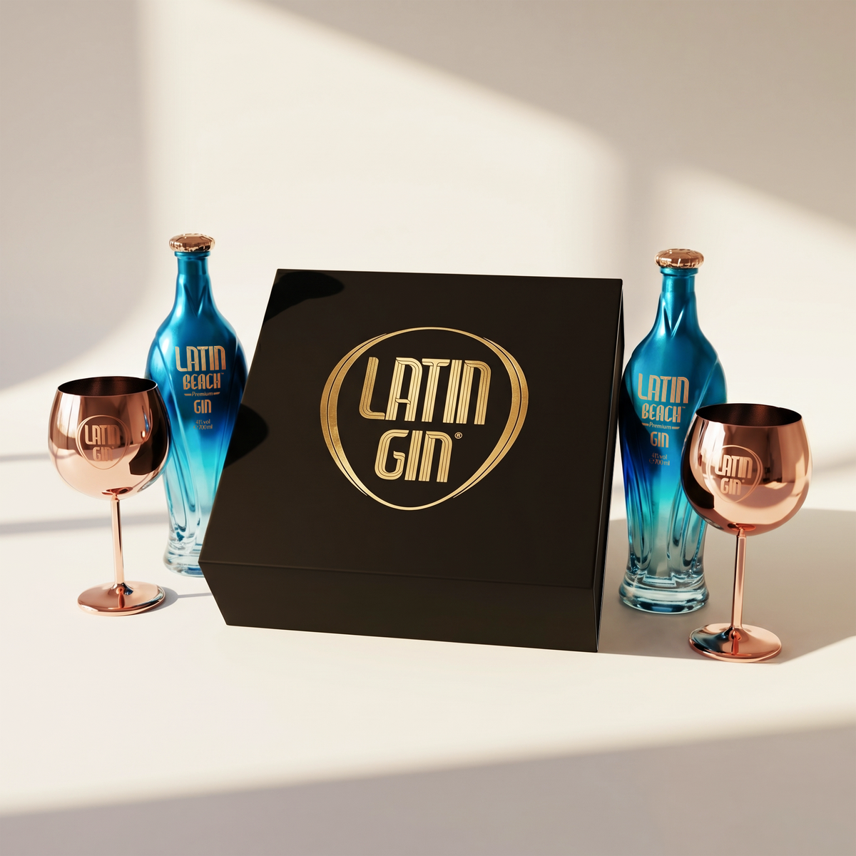 Latin Gin gift box with two bottles of Latin Beach Gin and two rose-gold copa glasses